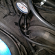 Incorrect hose clamp directly below the pressure gauge. Notice the dark spot below it.